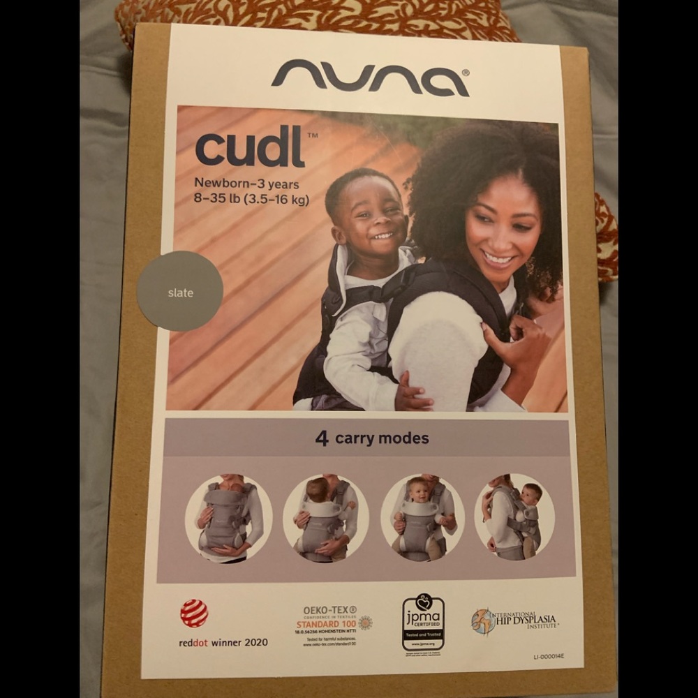 NUNA Cudl baby carrier.